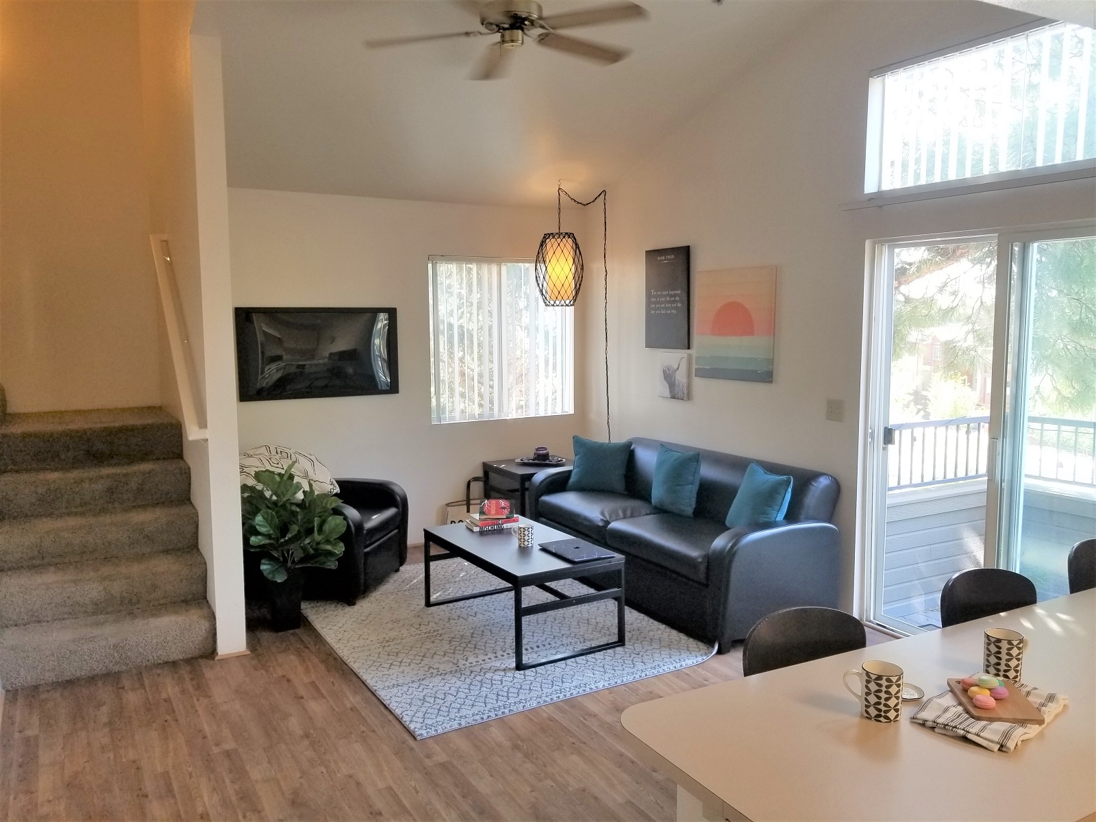 Ceiling Fan and Sofa in Living Room at Highland Village Apartments, Arizona, 86001